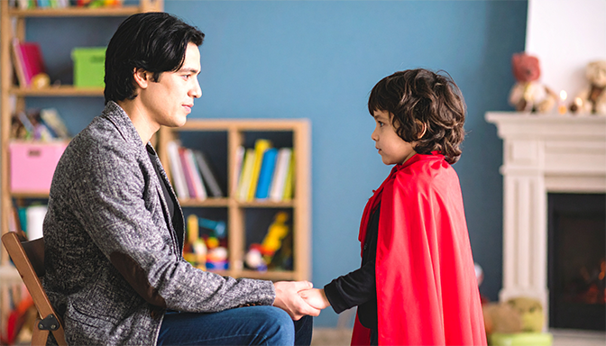 dad having calm planning conversation with child