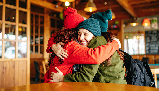embracing in joyful reunion hug