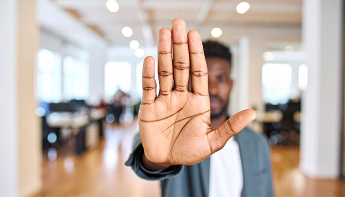 hand in stop gesture