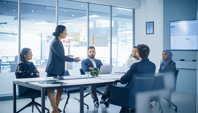 office meeting scene with manager clearly showing favoritism