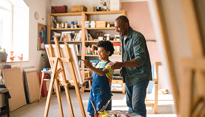 parent and child engaged in childs hobby