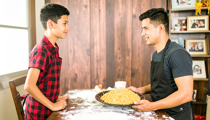 parent and teen doing special tradition