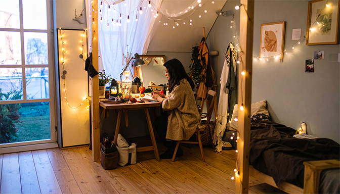 student sitting alone in dorm